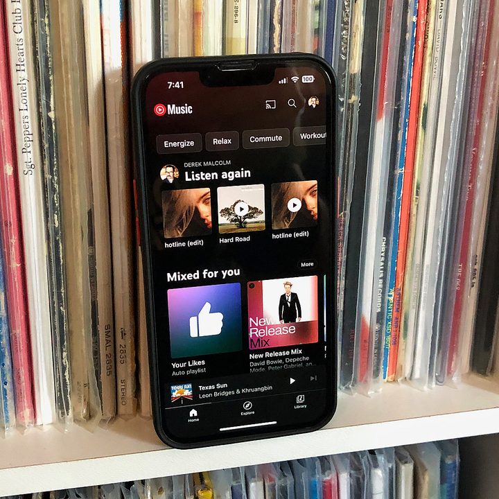 An iPhone with the YouTube Music app on it.
