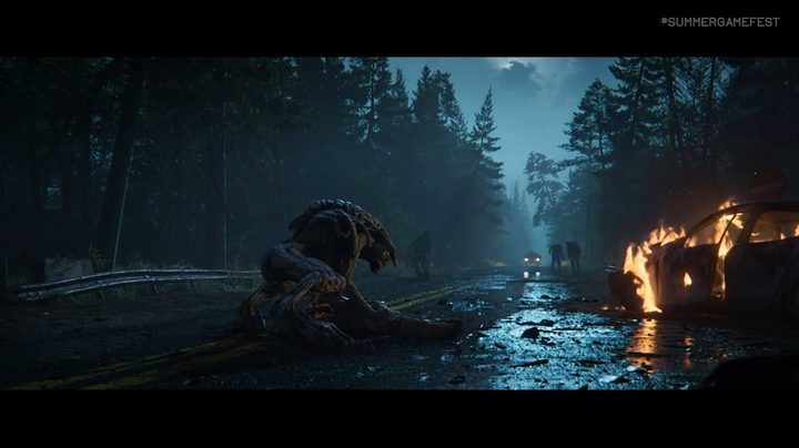 A zombie in the road with a car approaching.