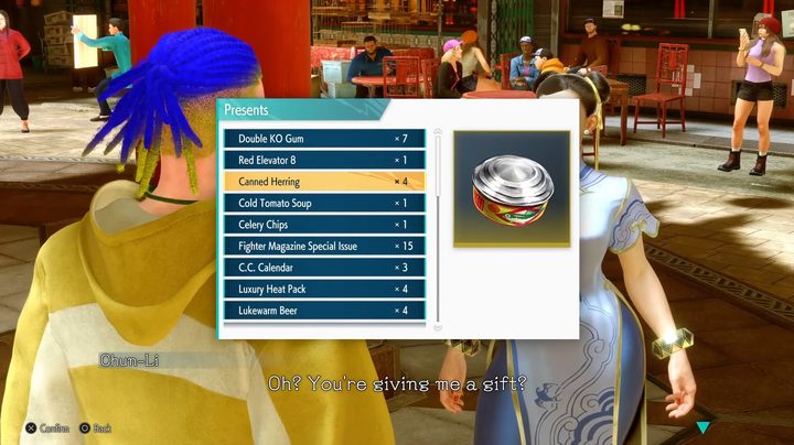 A character giving chun-li a can of fish.