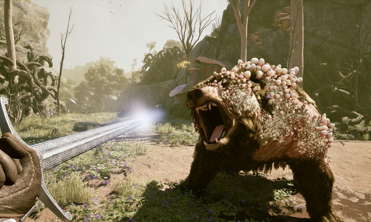 A player fights a bear in Avowed