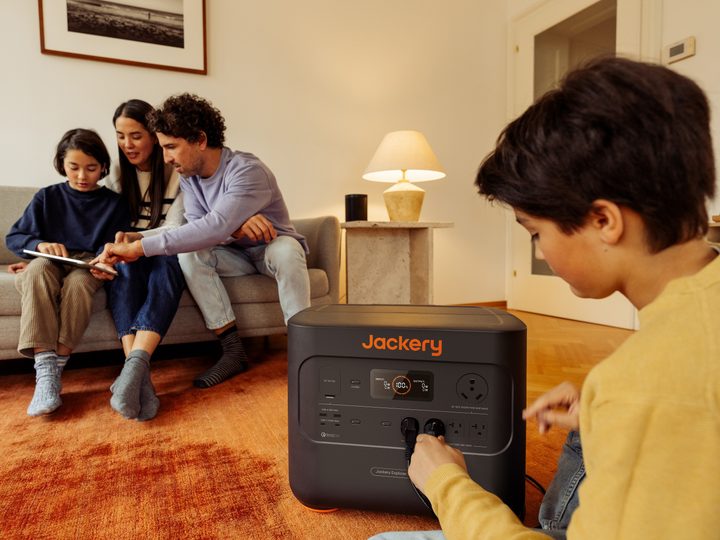 Family plugging devices into Jackery 2000 Plus