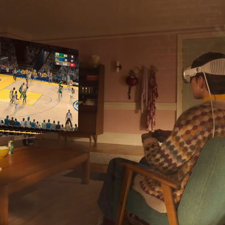 A person plays a game on the Apple Vision Pro.