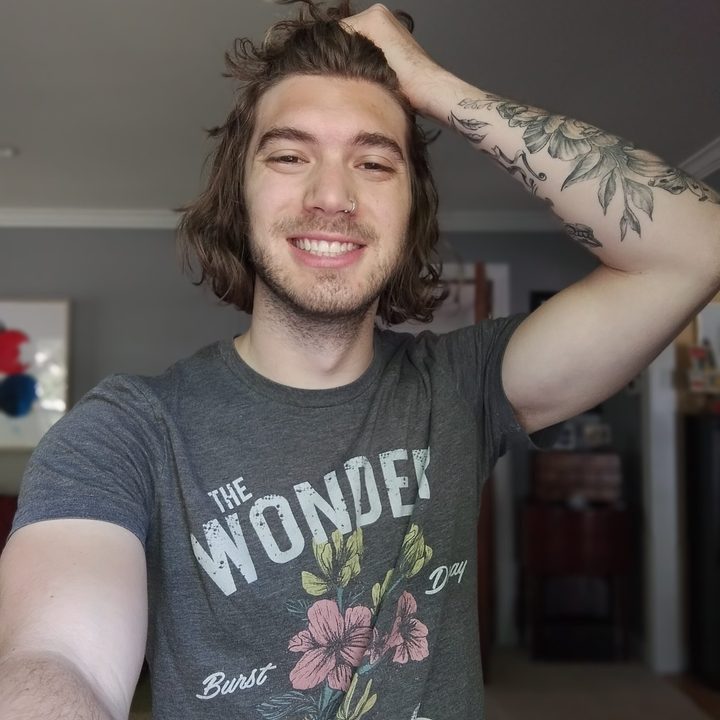A selfie of a man taken using the Moto G 5G's front-facing camera's portrait mode.