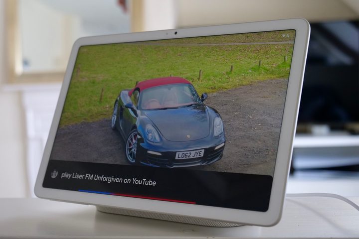 Google Pixel Tablet in white, attached to the dock.