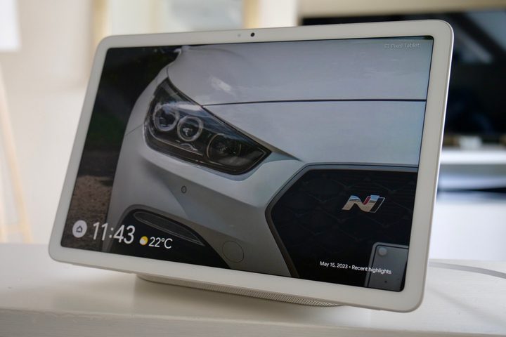 Google Pixel Tablet in white, attached to the dock.