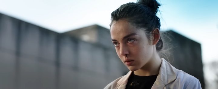 A young woman with a nosebleed in "Raw."