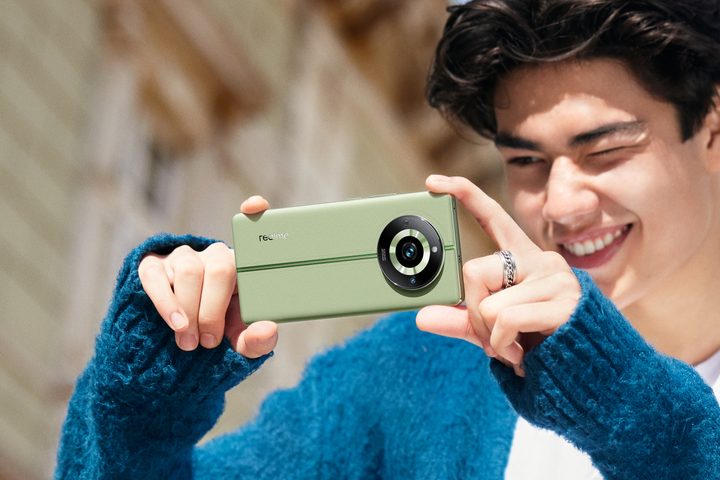 The Realme 11 Pro+ in Oasis Green color.