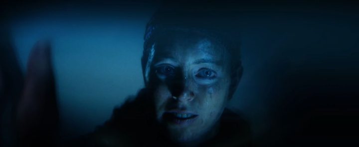 Senua looks into the water in Hellblade 2
