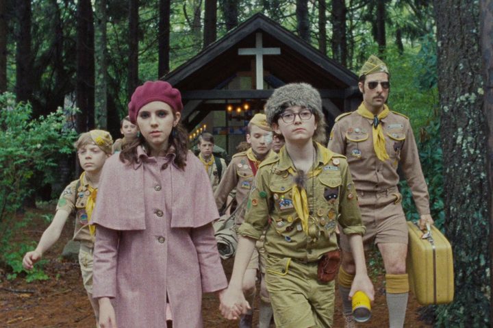 Suzy and Sam lead the Khaki scouts through the woods in Moonrise Kingdom.