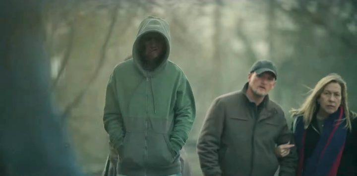 El Cuco wearing a green hoodie in "The Outsider."