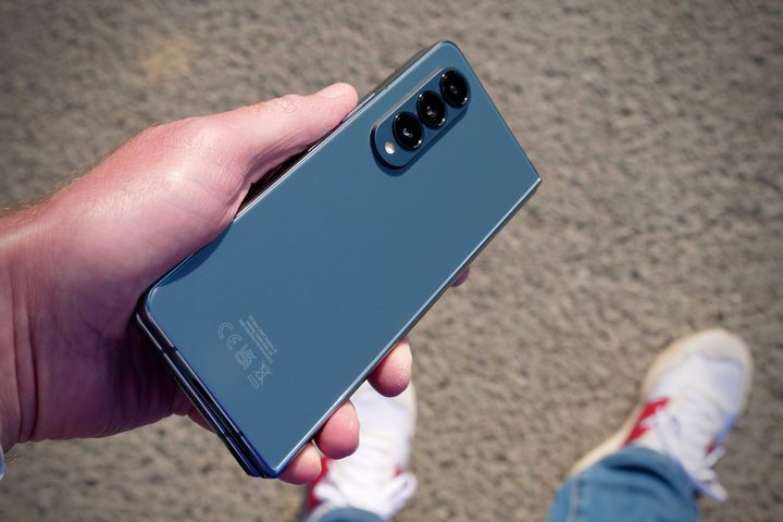 The back of the Galaxy Z Fold 4, held in a person's hand.