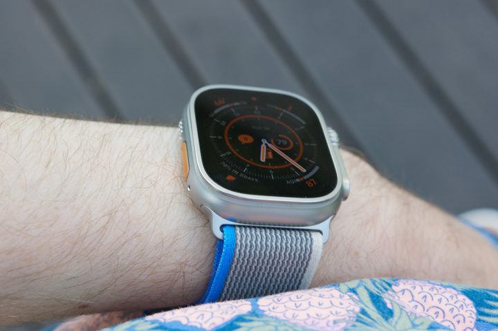 Someone wearing an Apple Watch Ultra, with their hand in their pocket.