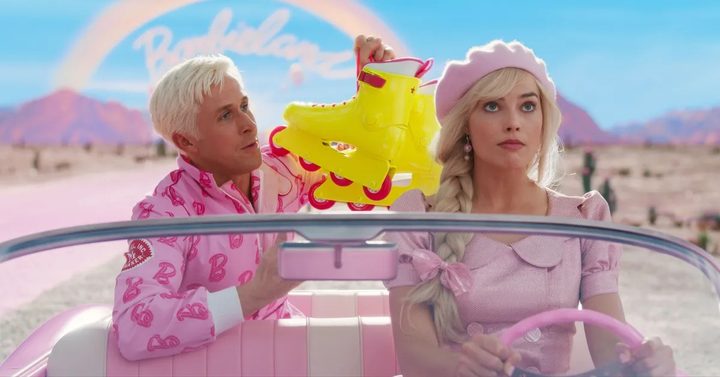 Ken holds up skates to Barbie in the Barbie trailer.