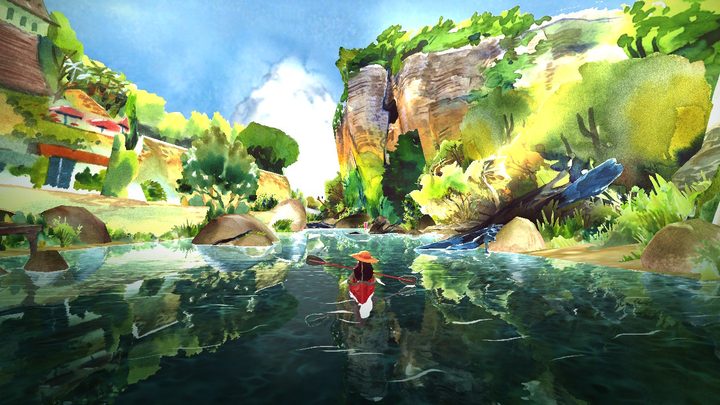 Mimi paddles down a river in a kayak in Dordogne.