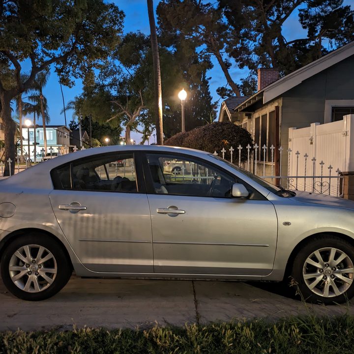 Car in driveway at night taken with Google Pixel 7a main camera night sight