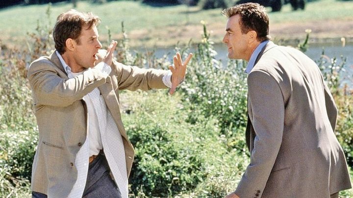 A man confronts another man in In & Out.