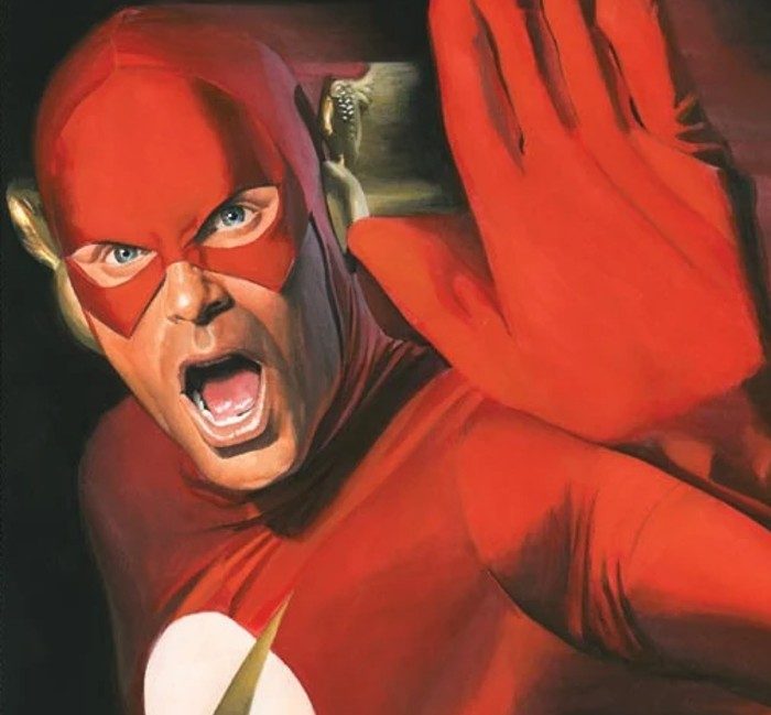 The Flash holds up his hand in a DC comic book.