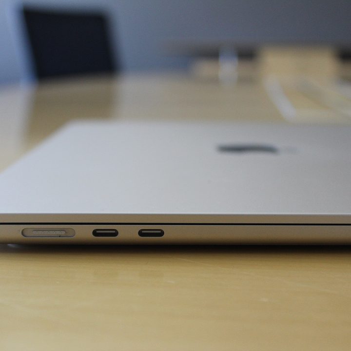 Apple's 15-inch MacBook Air placed on a desk with its lid closed.