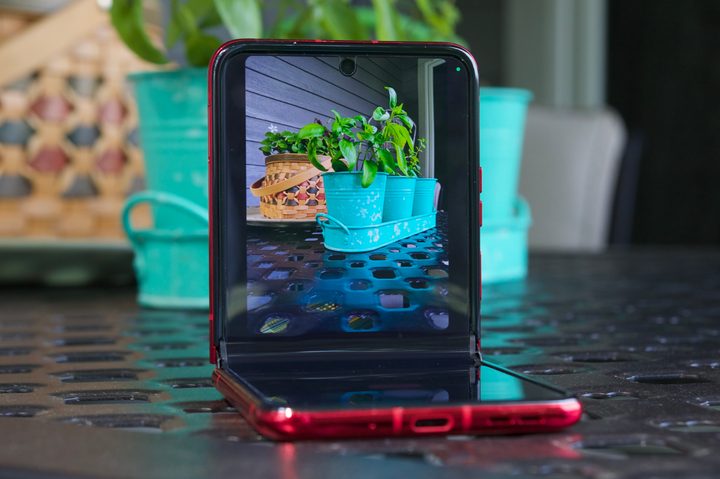 The Motorola Razr Plus, half-folded and with its camera app open.
