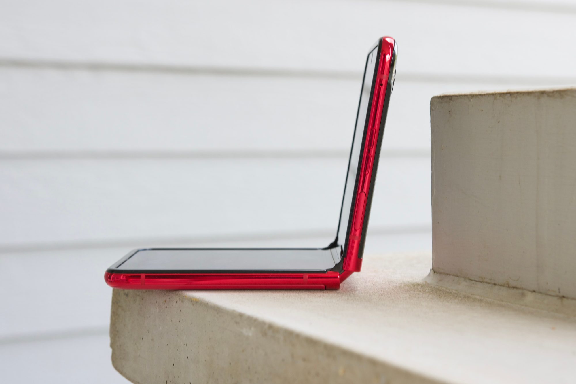 A side view of the Motorola Razr Plus half-opened.