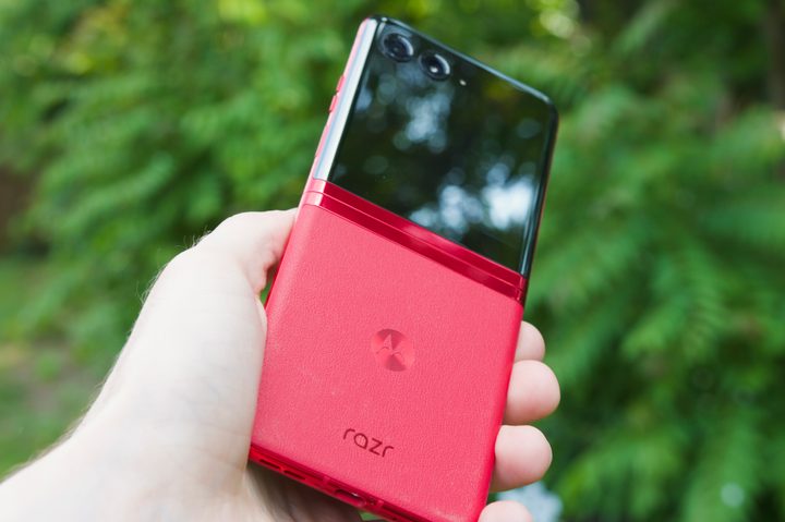 Someone holding the Motorola Razr Plus, showing its backside when opened.