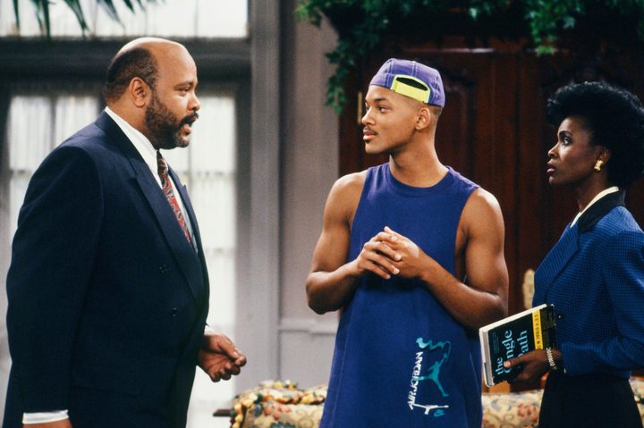 A father looks at his son and wife in The Fresh Prince of Bel-Air.