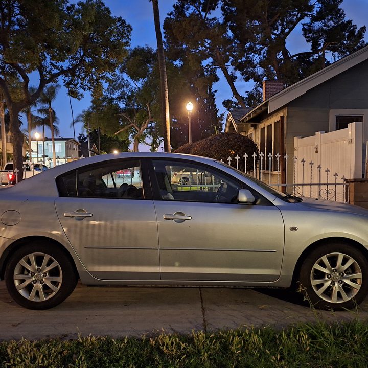 Car in driveway at night taken with Samsung Galaxy A54 night sight
