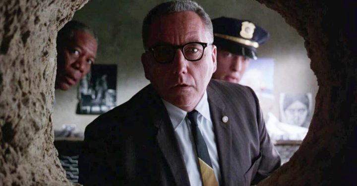 A man looks into a hole in The Shawshank Redemption.