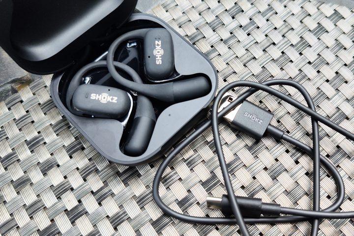 Shokz OpenFit with included charging cord.