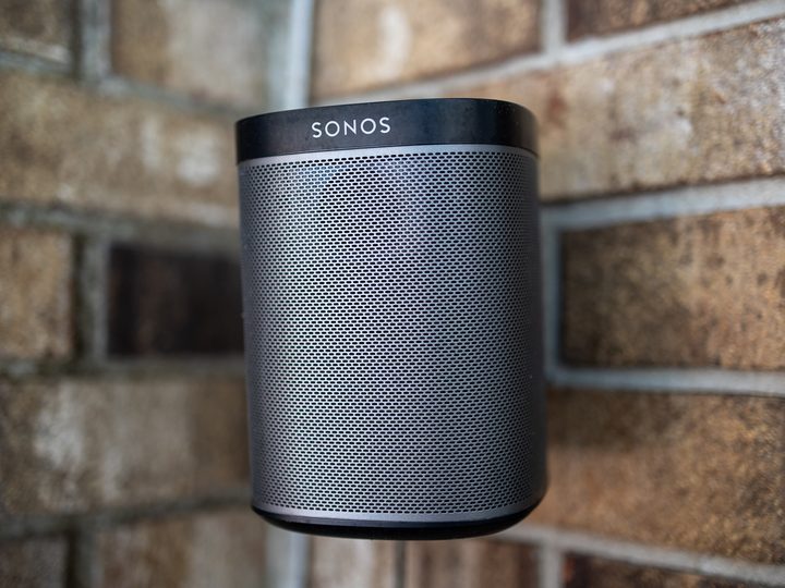 The Sonos Play:1 mounted on the brick wall.