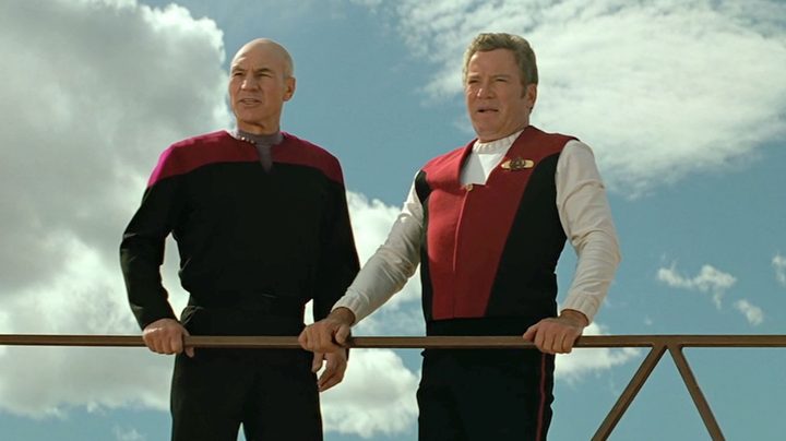 Kirk and Picard stand in Star Trek: Generations.