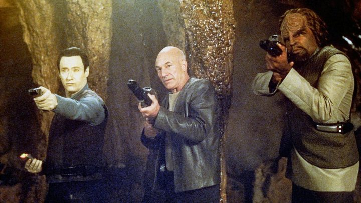 Picard and his crew aim their guns in Star Trek: Insurrection.