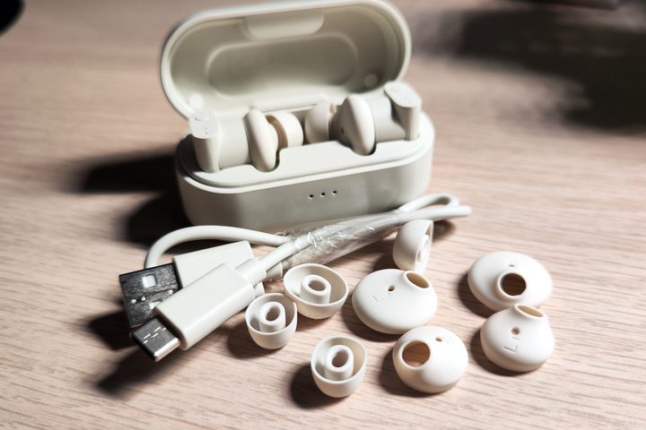 Status Audio Between 3ANC and included accessories.