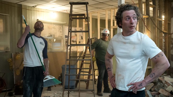 Breaking down a wall in the restaurant in a scene from The Bear.