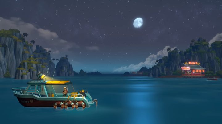 Dave on his boat looking at the water under a full moon.