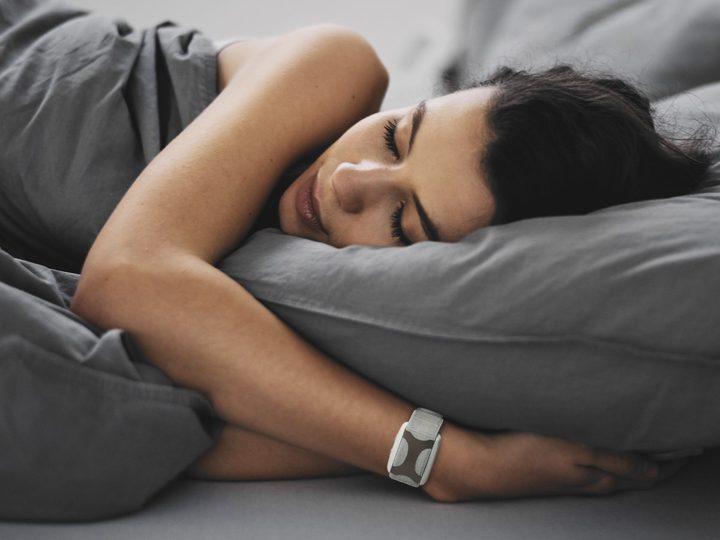 Apollo wearable worn during sleep in bed.
