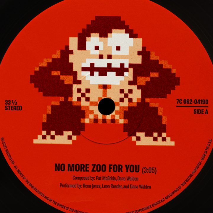 A pixelated Donkey Kong appears on a red vinyl record label.