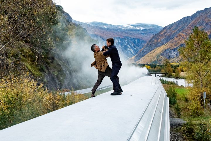 Esai Morales and Tom Cruise fight on top of a train in Mission: Impossible - Dead Reckoning Part One.