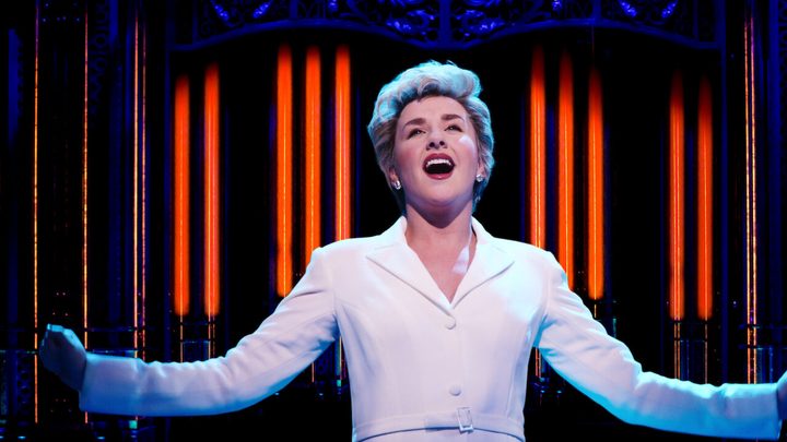 Jeanna de Waal as Princess Diana singing in Diana: The Musical.