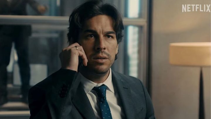 Mario Casas as Sebastián on the phone and looking shocked in Bird Box Barcelona.