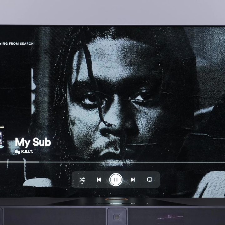 Album art from Big K.R.I.T displayed on a TV.