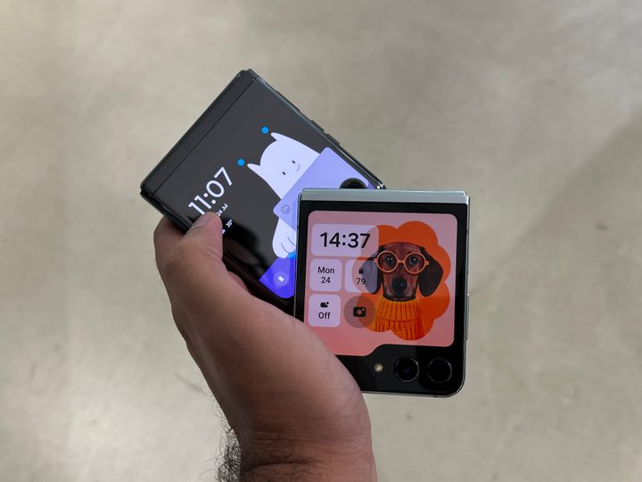 Motorola Razr Plus and Galaxy Z Flip 5 in hand.