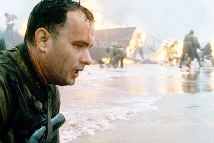 Tom Hanks appears shocked on a beach in Saving Private Ryan.