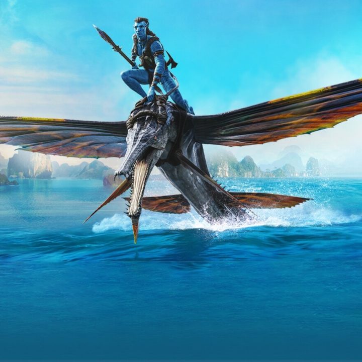 Jake Sully riding one of Pandora's underwater creatures in Avatar: The Way of Water.
