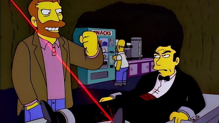 A man towers over another man on a table in The Simpsons.
