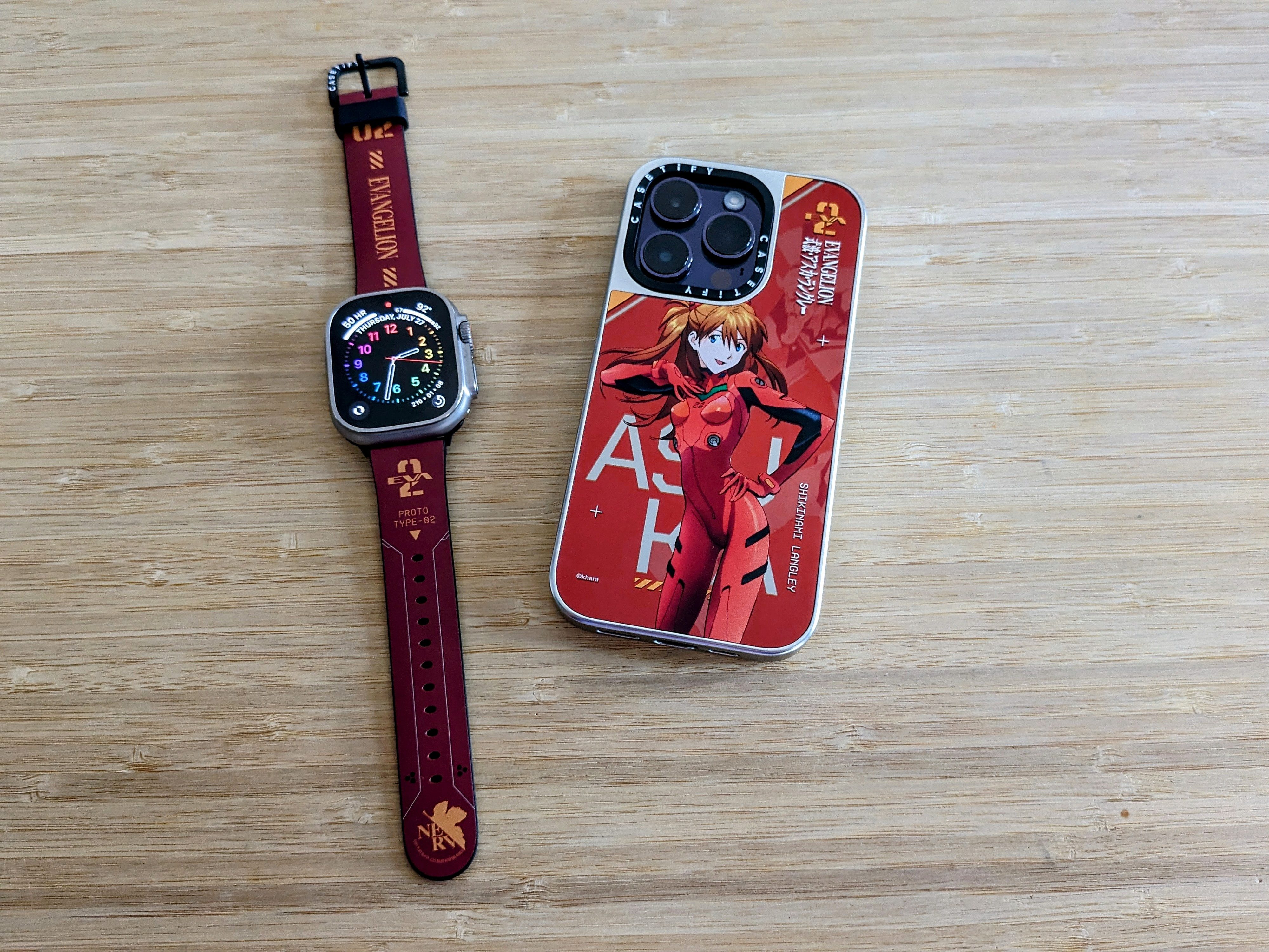 CASETiFY Evangelion Asuka Flexi Band with Asuka Mirror iPhone 14 Pro case.