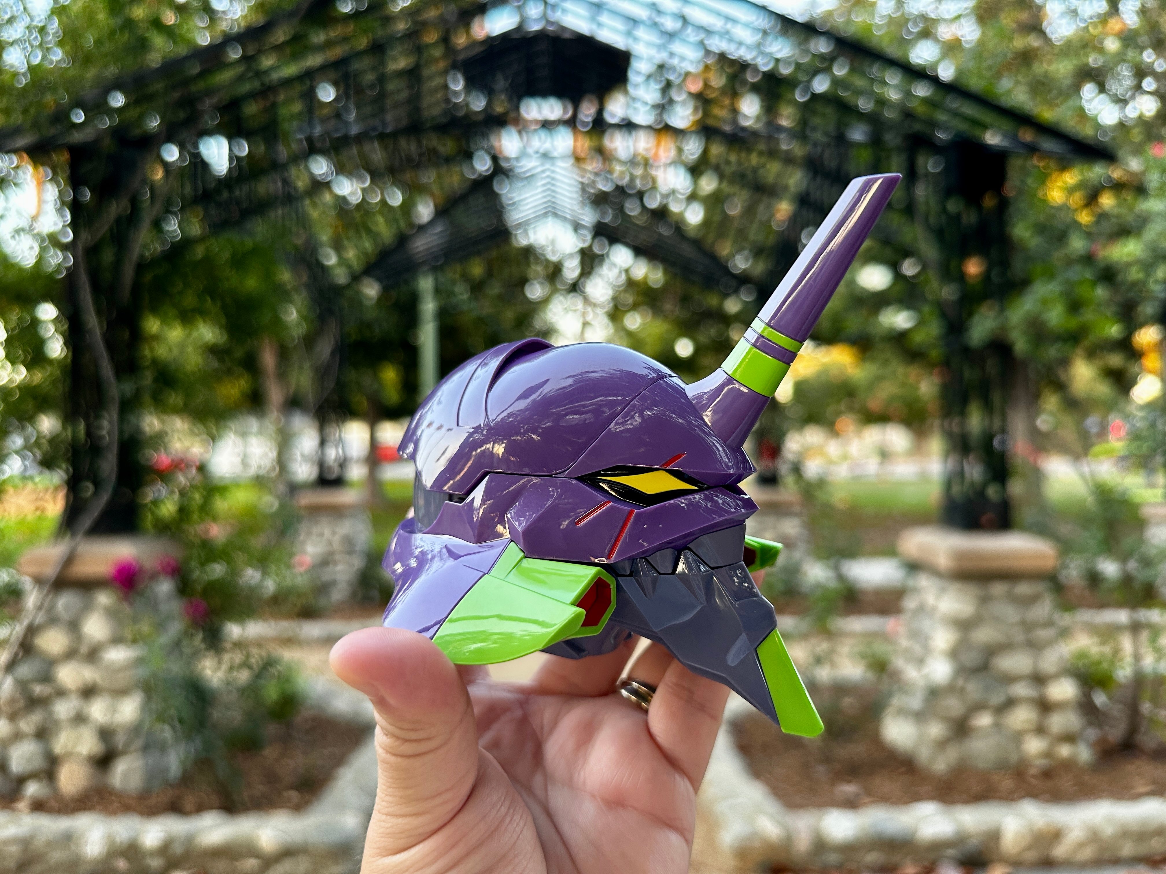 CASETiFY Evangelion Type-01 AirPods Pro 2 case in hand side view.