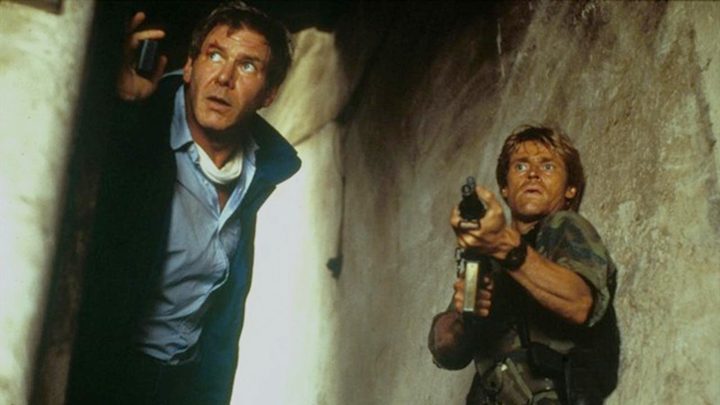 Two men wait for battle in Clear and Present Danger.