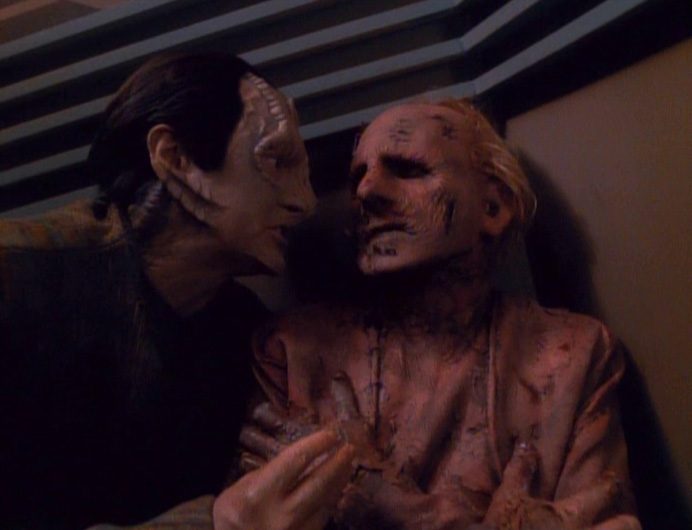 Elim Garak interrogates Odo, whose body is rapidly decaying, in the DS9 episode "The Die is Cast."