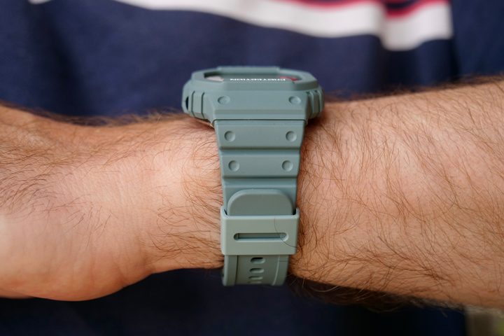 A person wearing the Casio G-Shock DW-H5600, showing the profile of the watch.